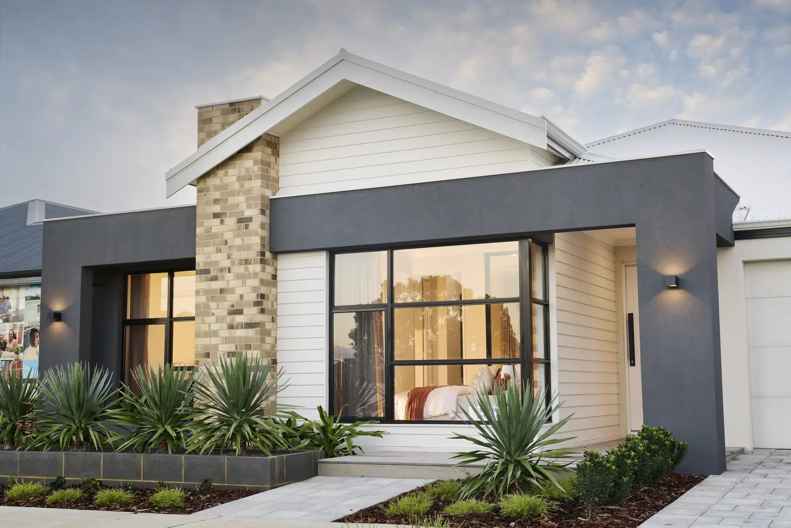 Modern single-storey Perth home with stone feature wall and dark render